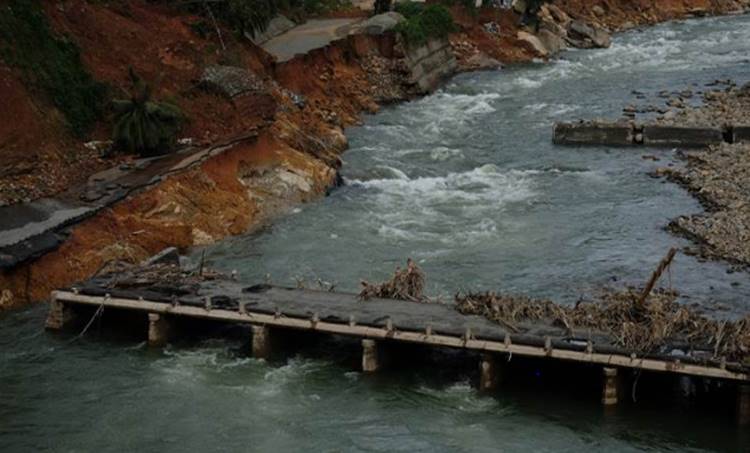 The bridge over the river collapsed when the shutters of the dam were openedExpress Photo Arun Janardhanan